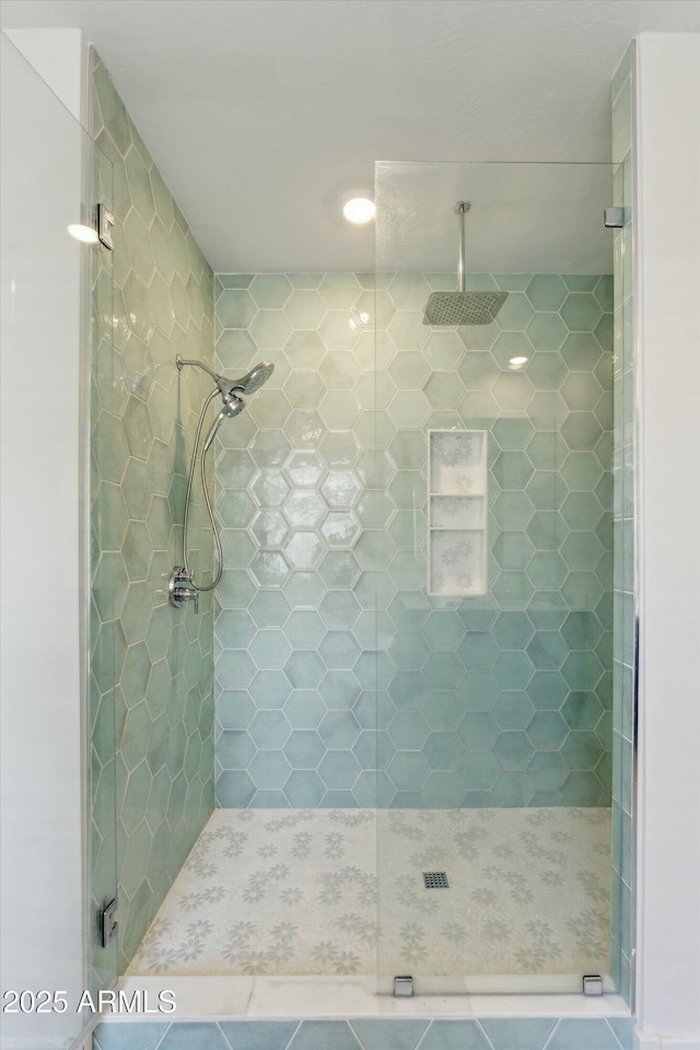 bathroom with a stall shower