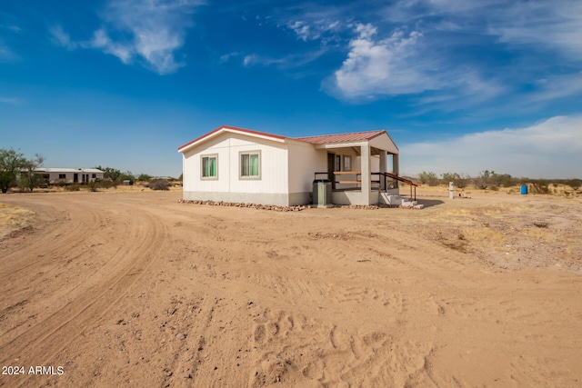 50858 W Bitter Root Rd, Maricopa, AZ 85139 - exterior space with metal roof