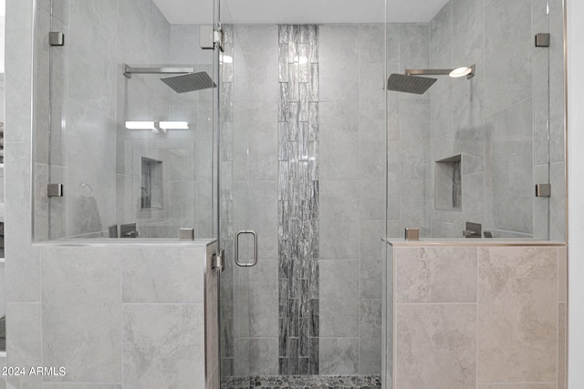 bathroom featuring a shower stall