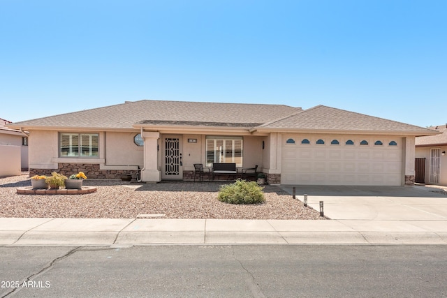 single story home featuring stucco siding, a porch, concrete driveway, a garage, and stone siding