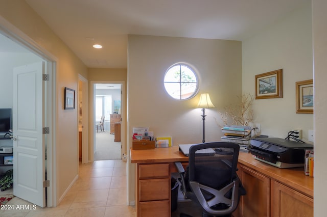 home office featuring light tile patterned floors