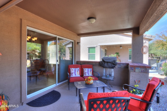 view of patio with outdoor lounge area and area for grilling