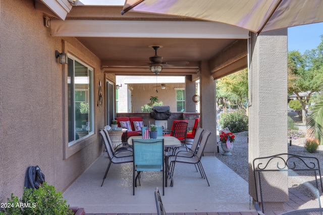 view of patio / terrace featuring ceiling fan