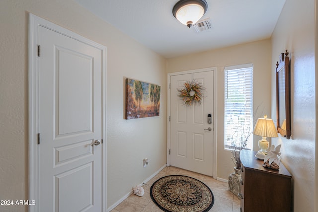 view of tiled foyer entrance