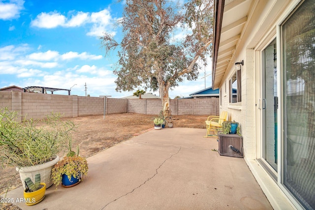 view of patio / terrace with a fenced backyard