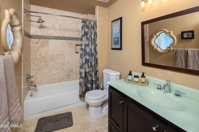 bathroom featuring visible vents, vanity, toilet, and shower / bathtub combination with curtain