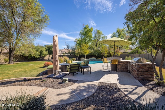 view of patio / terrace with a grill, a fenced in pool, a fenced backyard, and area for grilling