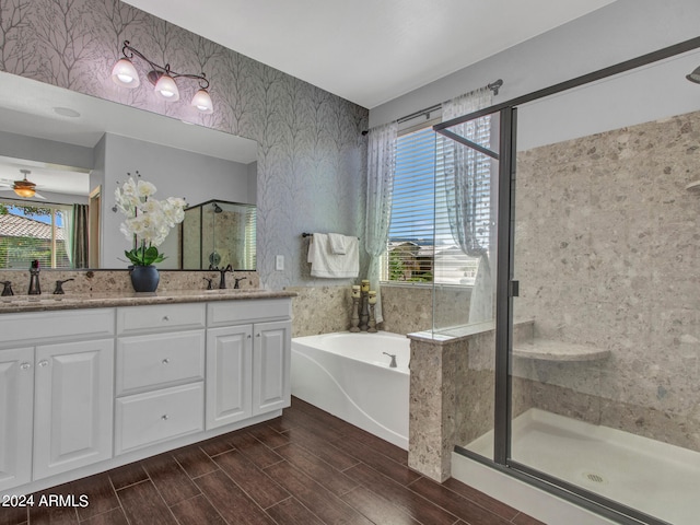 bathroom with vanity, separate shower and tub, and ceiling fan