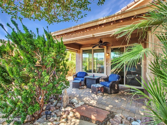 view of patio featuring outdoor lounge area and ceiling fan