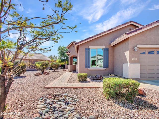 view of front of property featuring a garage