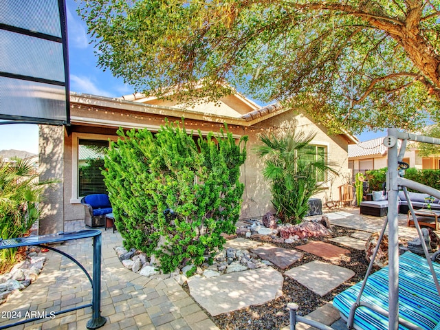 view of patio featuring a jacuzzi