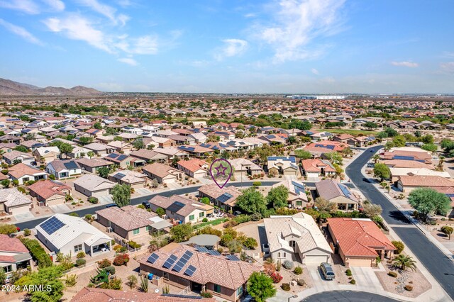 birds eye view of property featuring a mountain view