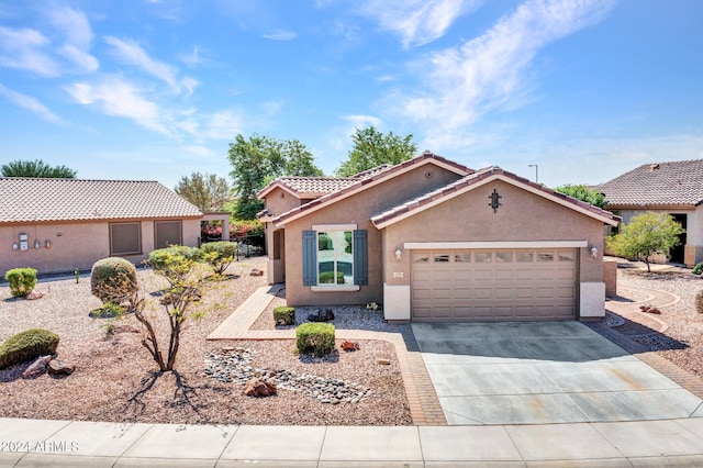 view of front of property featuring a garage