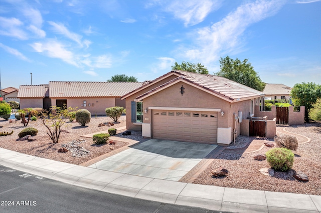 view of front of property with a garage