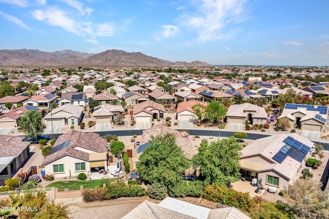 birds eye view of property featuring a mountain view