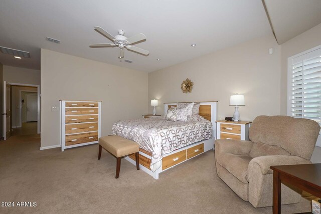 carpeted bedroom with ceiling fan