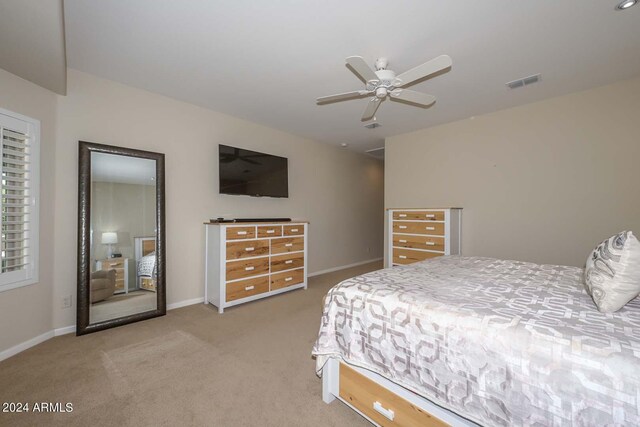 bedroom featuring carpet floors and ceiling fan