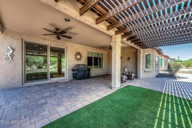 view of patio / terrace with ceiling fan, a pergola, and a grill