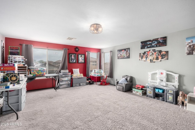 playroom with carpet and visible vents