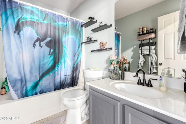 bathroom with toilet, vanity, and shower / bath combo with shower curtain