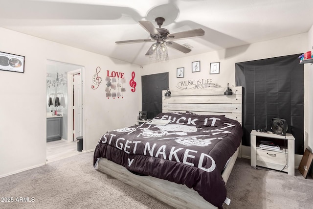 bedroom featuring visible vents, ensuite bathroom, carpet, baseboards, and ceiling fan