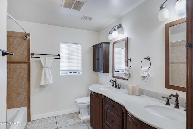 full bathroom featuring vanity, shower / tub combination, toilet, and tile patterned floors