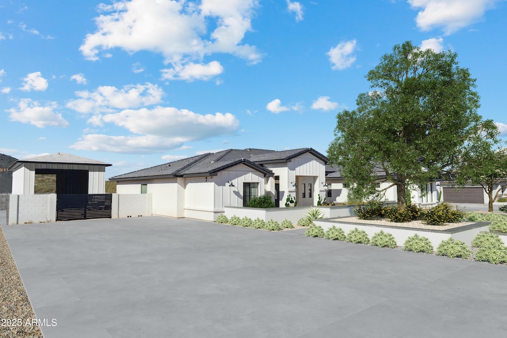 1620 W Butte Canyon Rd, Phoenix, AZ 85086 - modern inspired farmhouse featuring board and batten siding and a gate