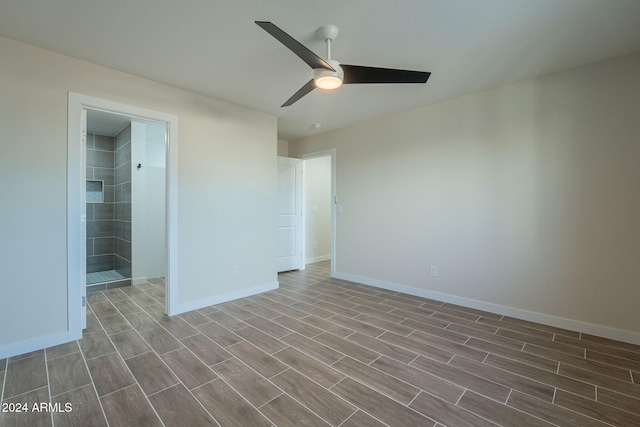 empty room featuring ceiling fan and wood-type flooring