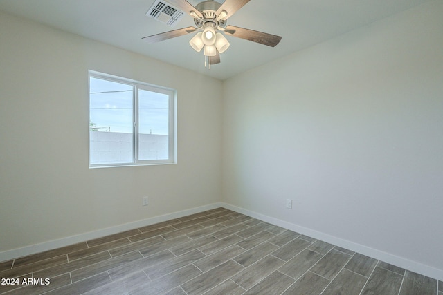 unfurnished room with ceiling fan