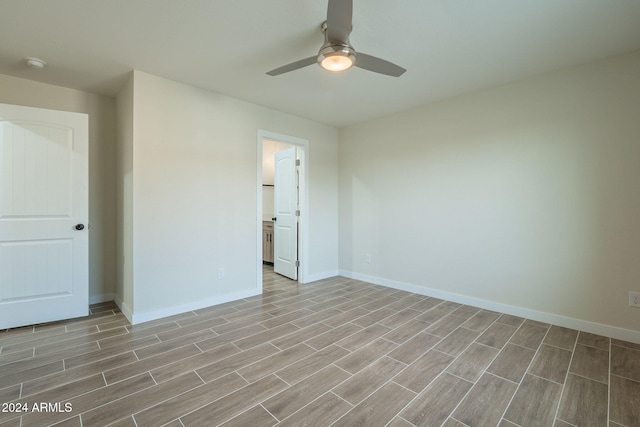 unfurnished room featuring ceiling fan and light hardwood / wood-style flooring