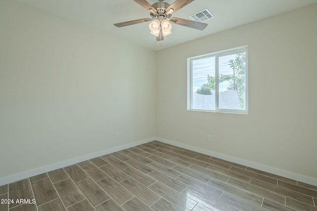 unfurnished room with wood-type flooring and ceiling fan