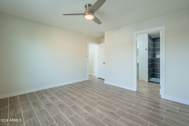 spare room featuring ceiling fan and light wood-type flooring