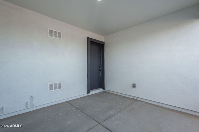 interior space featuring concrete flooring