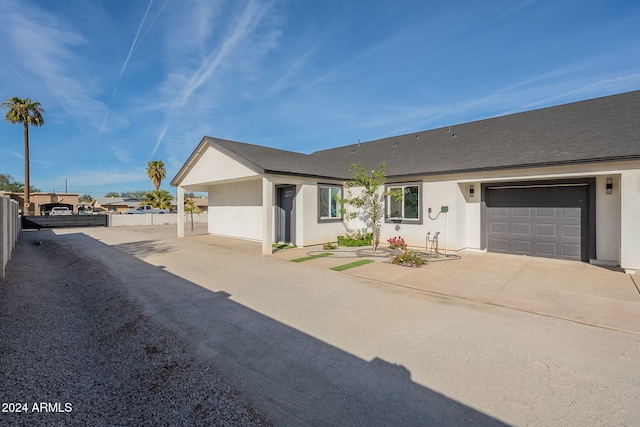 ranch-style home with a garage