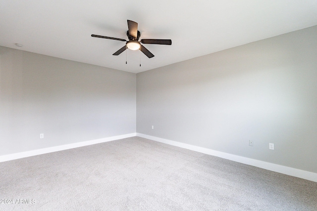 unfurnished room featuring carpet flooring and ceiling fan