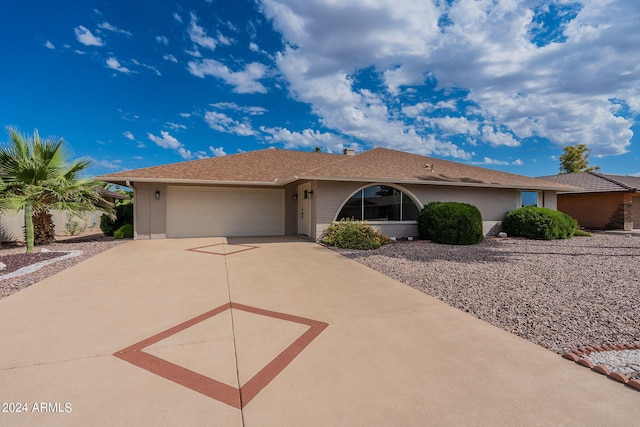 single story home with a garage