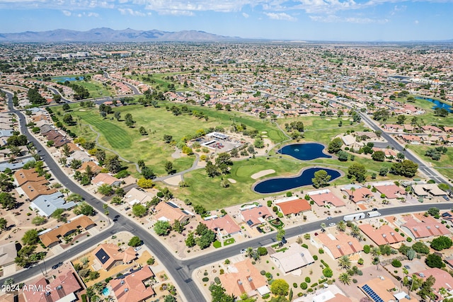 bird's eye view with a water and mountain view