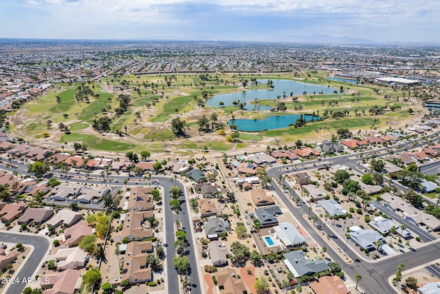 drone / aerial view with a water view