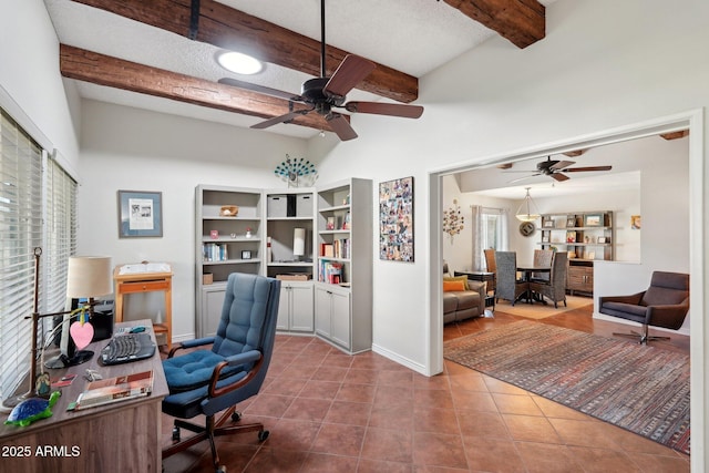 tiled home office featuring beam ceiling and ceiling fan