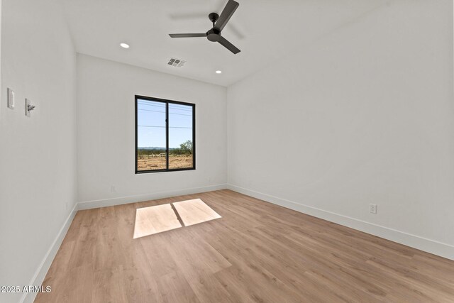 34256 S State Route 89th Hwy, Wickenburg, AZ 85390 - empty room with light wood-type flooring, baseboards, a ceiling fan, and recessed lighting