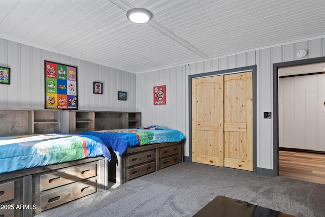 bedroom featuring metal wall