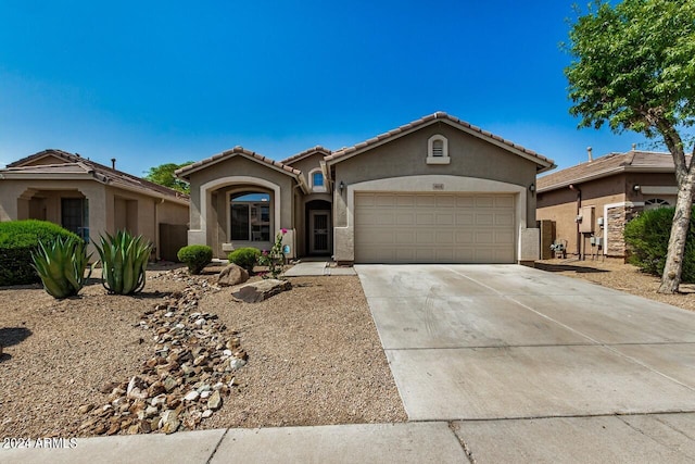 view of front of property with a garage