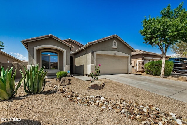 view of front of property with a garage