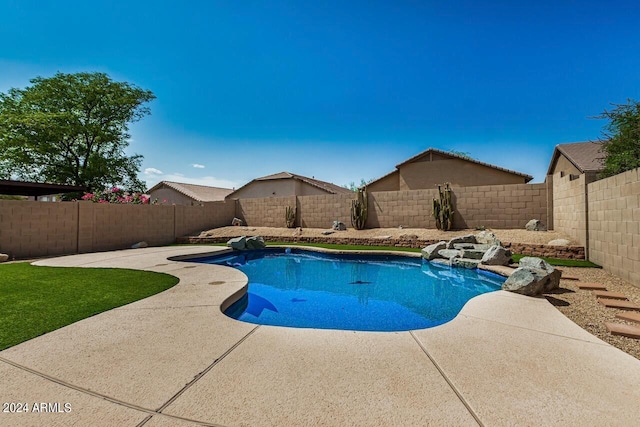 view of pool featuring a patio