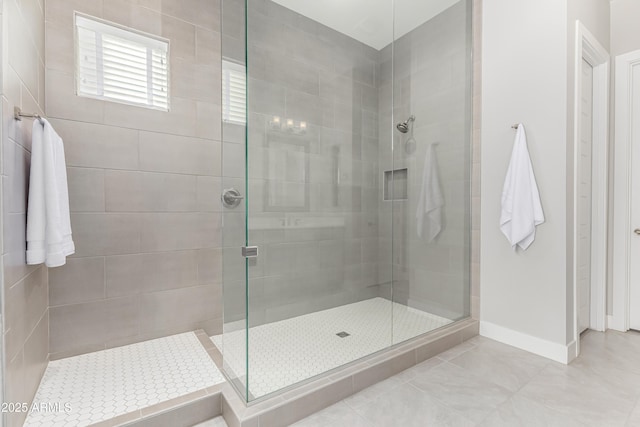 bathroom featuring tile patterned floors and walk in shower