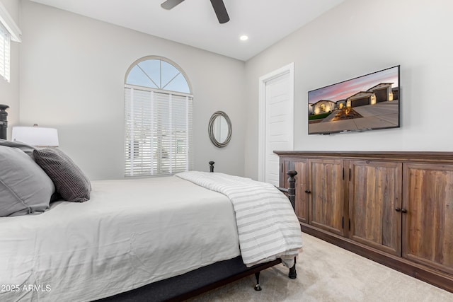 carpeted bedroom featuring ceiling fan