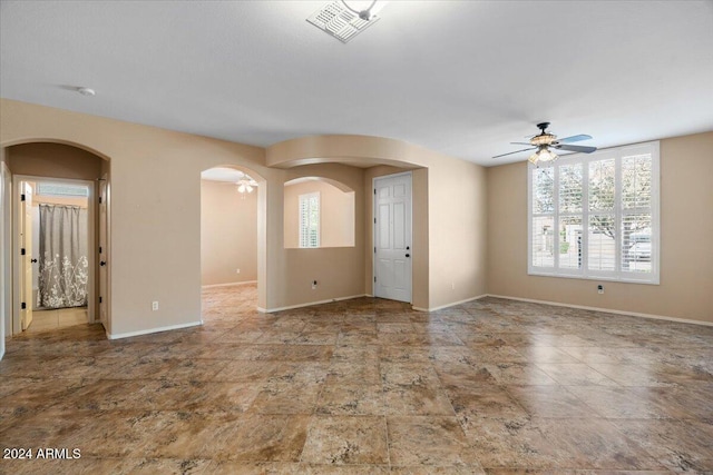 spare room featuring ceiling fan