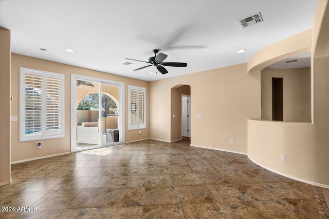 empty room featuring ceiling fan