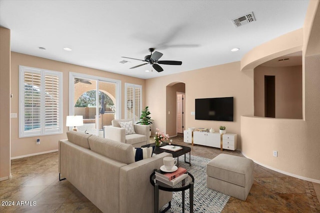 living room with ceiling fan