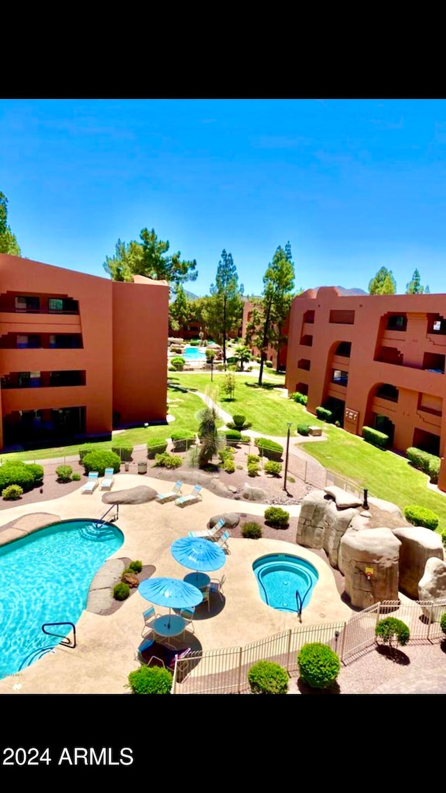 view of pool featuring a patio